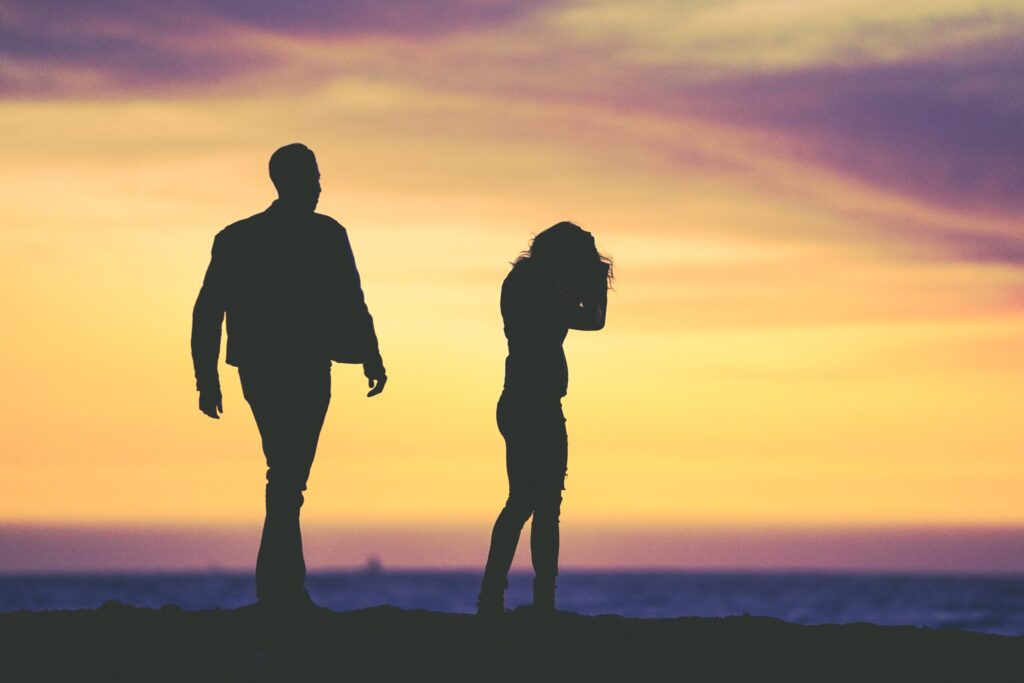 unhappy couple in blog about signs of trauma bonding by erin moore centered one