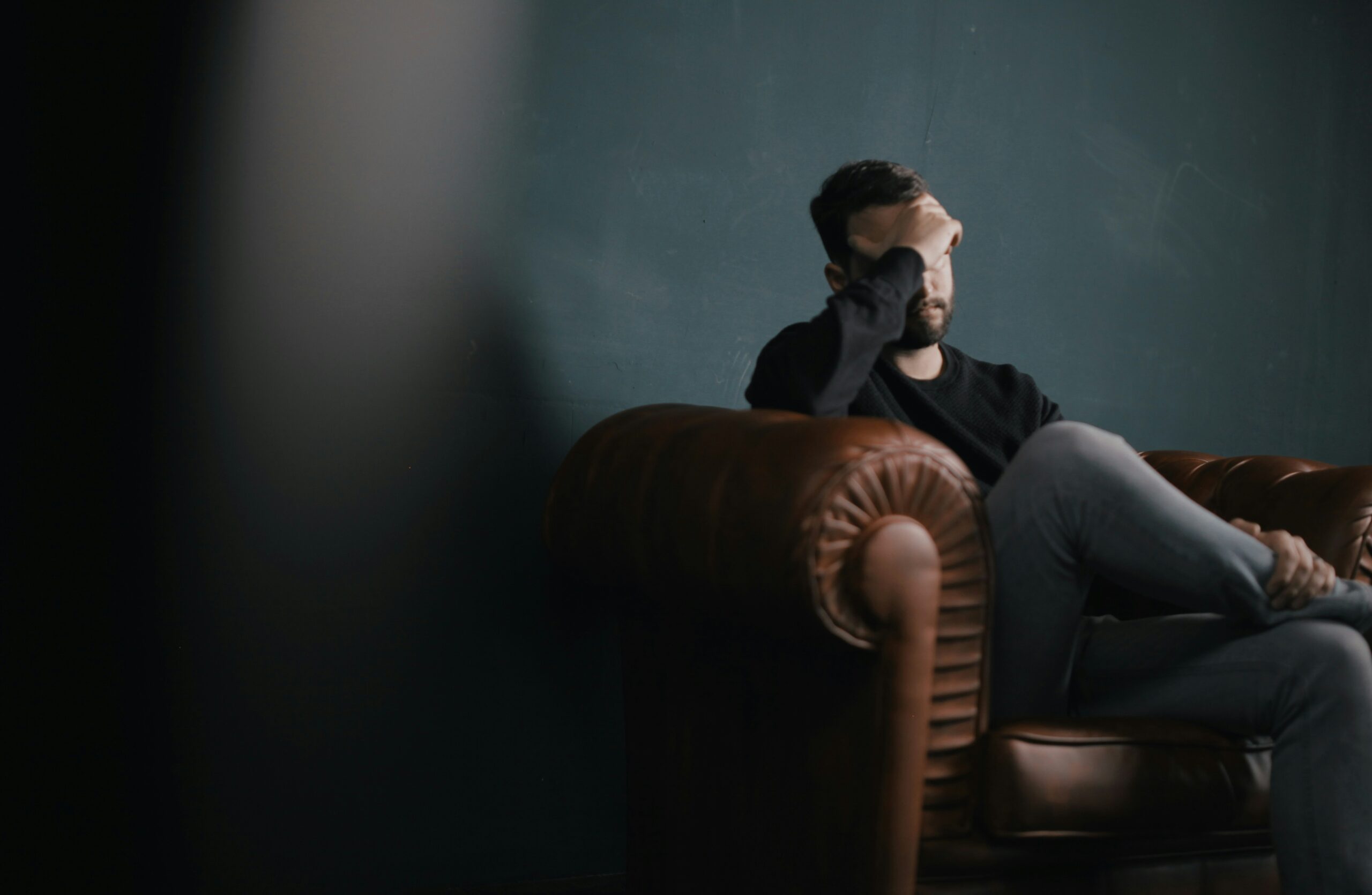 frustrated man in blog about emotional withdrawal in relationships by erin moore centered one