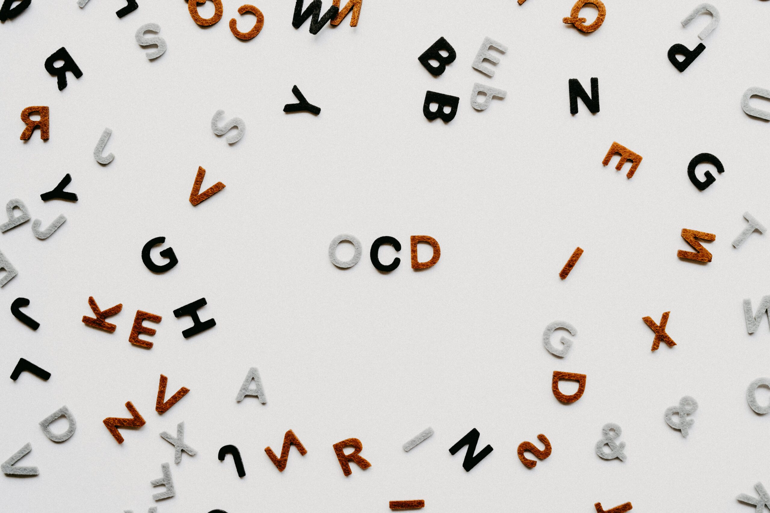 OCD letters scrambled in blog about OCD coping skills by erin moore centered one