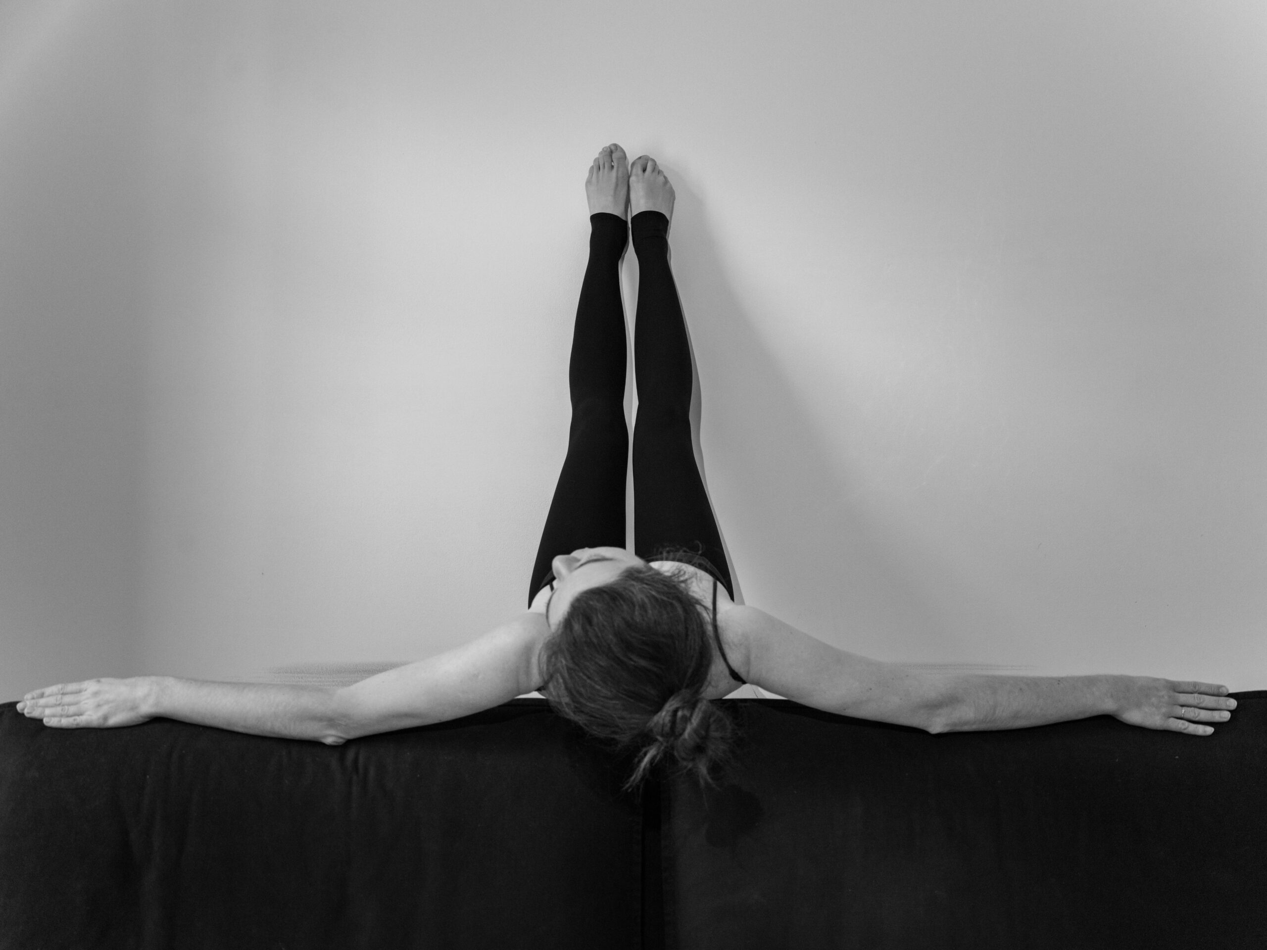 somatic yoga pose woman in blog about somatic exercises for anxiety by erin moore centered one