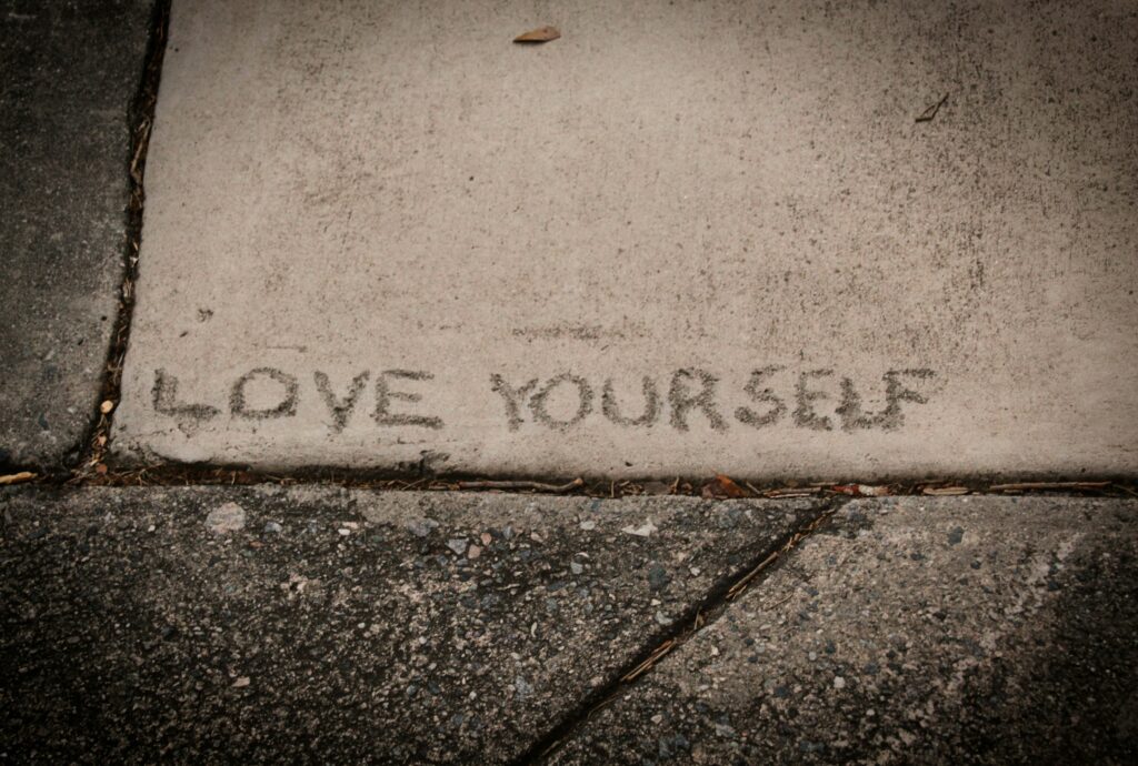 love yourself written in pavement in blog about do narcissists feel guilt by erin moore centered one